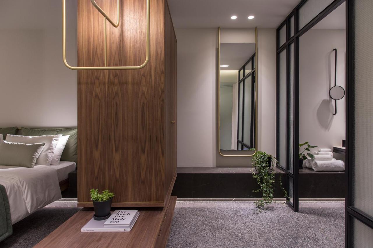 Perianth Hotel Атина Екстериор снимка The interior of a bedroom at The Standard East Village
